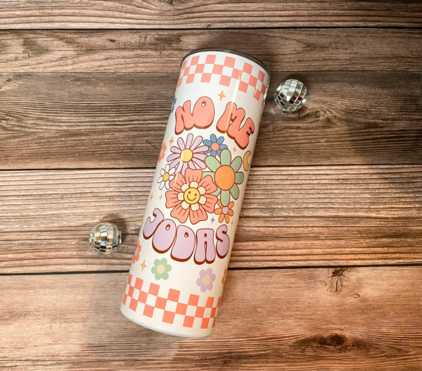 Sip in style with our 'No Me Jodas' 20 oz skinny tumbler! This stainless steel tumbler keeps your drinks cool and your attitude cooler. Perfect for on-the-go sass!