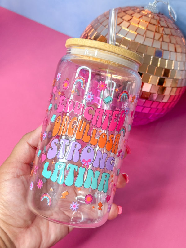 Sip in style with our 16oz glass beer can cup featuring "Educated Orgullosa Strong Latina" in a double-sided UV DTF design. Includes bamboo lid and straw. Perfect for your favorite drinks, this cup is a must-have for any proud Latina.