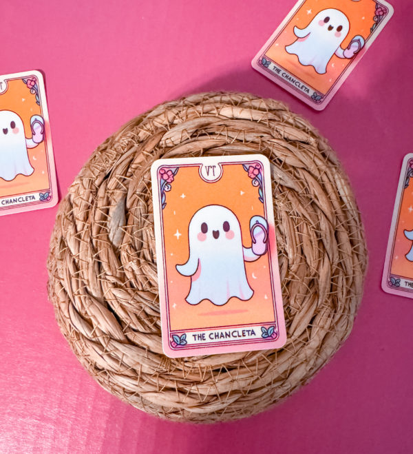 Unleash some spooky vibes with our Tarot-Inspired Ghost Holding a Chancleta Sticker!