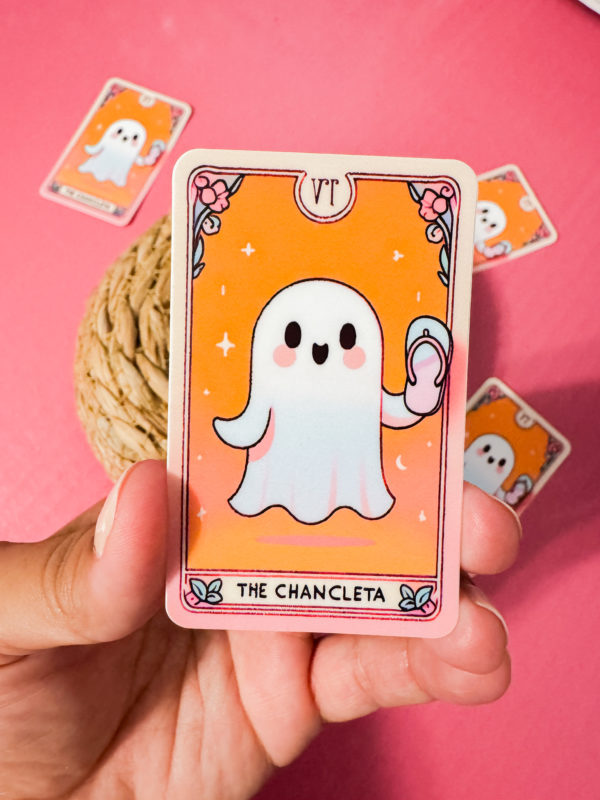 Unleash some spooky vibes with our Tarot-Inspired Ghost Holding a Chancleta Sticker!