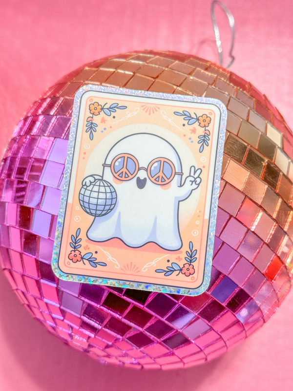 A holographic ghost in groovy sunglasses, holding a disco ball with the peace sign up in a tarot card style